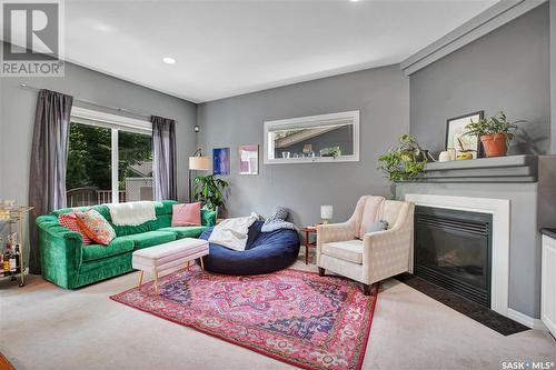 1212 Elliott Street, Saskatoon, SK - Indoor Photo Showing Living Room With Fireplace