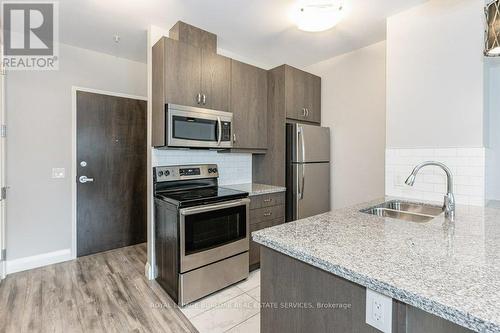 418 - 118 King Street E, Hamilton (Beasley), ON - Indoor Photo Showing Kitchen With Stainless Steel Kitchen With Double Sink With Upgraded Kitchen