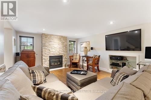 19 Queen Mary Drive, St. Catharines, ON - Indoor Photo Showing Living Room With Fireplace