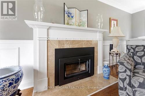 19 Queen Mary Drive, St. Catharines, ON - Indoor Photo Showing Living Room With Fireplace