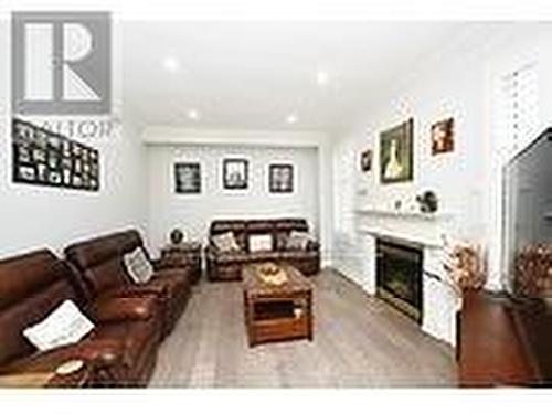 225 Father Tobin Road, Brampton (Sandringham-Wellington), ON - Indoor Photo Showing Living Room With Fireplace