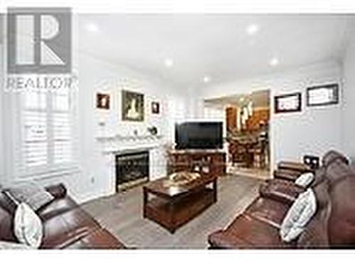 225 Father Tobin Road, Brampton (Sandringham-Wellington), ON - Indoor Photo Showing Living Room With Fireplace