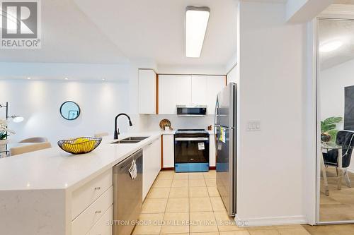 211 - 5500 Yonge Street, Toronto, ON - Indoor Photo Showing Kitchen With Double Sink