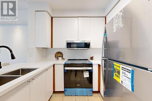 211 - 5500 Yonge Street, Toronto, ON - Indoor Photo Showing Kitchen With Double Sink