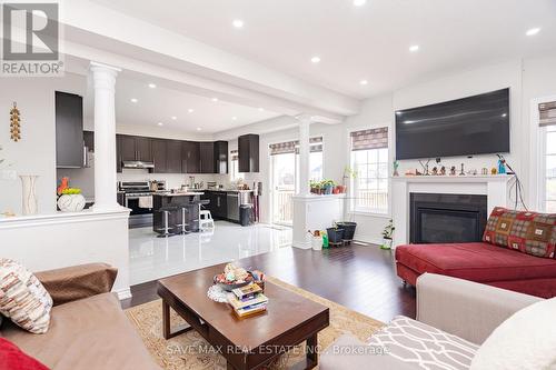 16 Action Drive, Brampton (Northwest Brampton), ON - Indoor Photo Showing Living Room With Fireplace