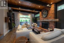 Family room with custom touches shelves, fireplace - 