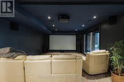 Theater with 100 inch screen with walk out to yard - 