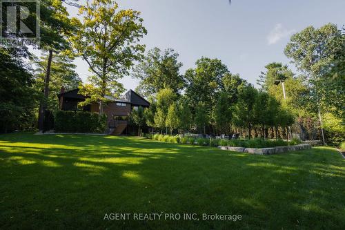 Large back yard featuring sports court fire pit - 45 Blackburn Crescent, Middlesex Centre (Kilworth), ON - Outdoor