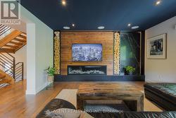 Custom back lit wall  with 70 inch fireplace - 