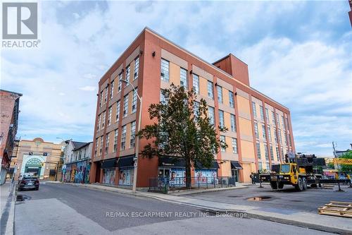 401 - 11 Rebecca Street, Hamilton (Beasley), ON - Outdoor With Facade