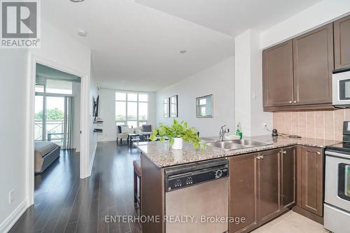 617 - 20 Bloorview Place, Toronto, ON - Indoor Photo Showing Kitchen With Double Sink