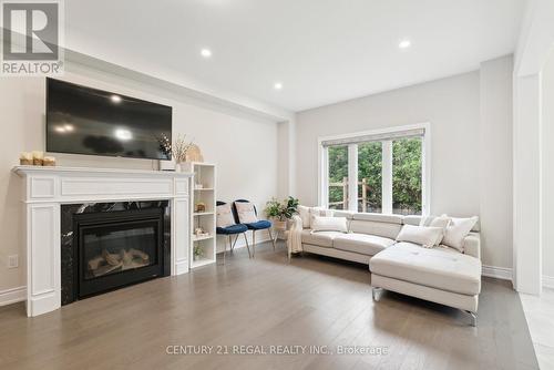 126 Heritage Street, Bradford West Gwillimbury, ON - Indoor Photo Showing Living Room With Fireplace