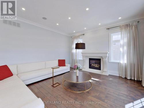 83 Ridgevale Drive, Toronto (Englemount-Lawrence), ON - Indoor Photo Showing Living Room With Fireplace