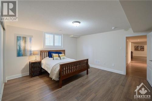 Fully fenced backyard with deck - 3243 Harvester Crescent, Kemptville, ON - Indoor Photo Showing Bedroom