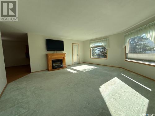 106 4451 Nicurity Drive, Regina, SK - Indoor With Fireplace