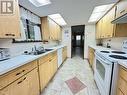 117/105 Sundial Road, Oliver, BC  - Indoor Photo Showing Kitchen With Double Sink 