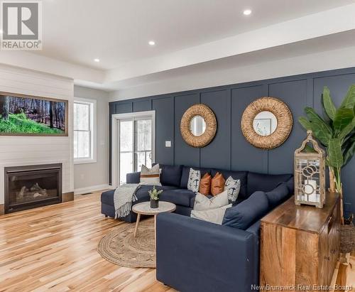 37 Boxwood Lane, New Maryland, NB - Indoor Photo Showing Living Room With Fireplace