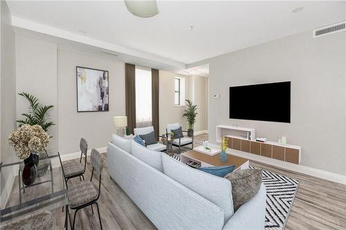 Virtually Staged - 118 King Street E|Unit #418, Hamilton, ON - Indoor Photo Showing Living Room