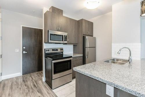 118 King Street E|Unit #418, Hamilton, ON - Indoor Photo Showing Kitchen With Stainless Steel Kitchen With Double Sink With Upgraded Kitchen