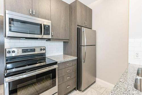 118 King Street E|Unit #418, Hamilton, ON - Indoor Photo Showing Kitchen With Stainless Steel Kitchen