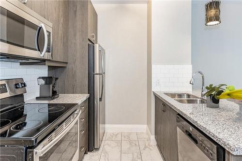 Virtually Staged - 118 King Street E|Unit #418, Hamilton, ON - Indoor Photo Showing Kitchen With Double Sink