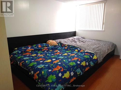 209 - 120 Dundalk Drive, Toronto (Dorset Park), ON - Indoor Photo Showing Bedroom