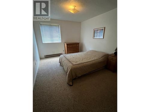 216 Spieker Avenue Unit# 216, Tumbler Ridge, BC - Indoor Photo Showing Bedroom