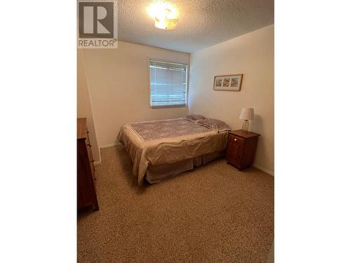 216 Spieker Avenue Unit# 216, Tumbler Ridge, BC - Indoor Photo Showing Bedroom