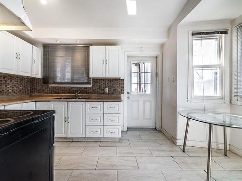 Cuisine - 7510 Ch. Guelph, Côte-Saint-Luc, QC - Indoor Photo Showing Kitchen With Double Sink