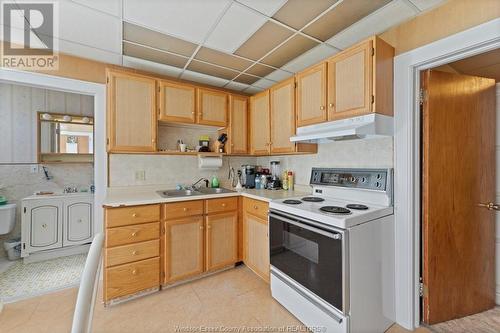 12147 St. Jacques Street, Tecumseh, ON - Indoor Photo Showing Kitchen With Double Sink