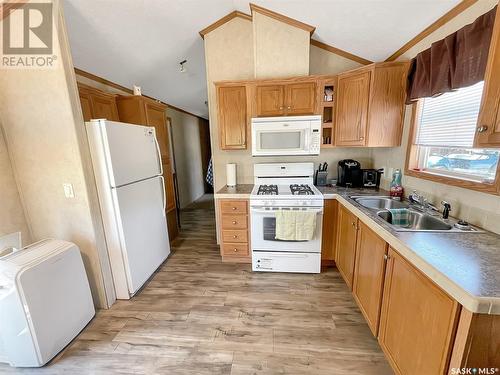 Merilee Way, Rock Ridge Rv Resort, Webb Rm No. 138, SK - Indoor Photo Showing Kitchen With Double Sink