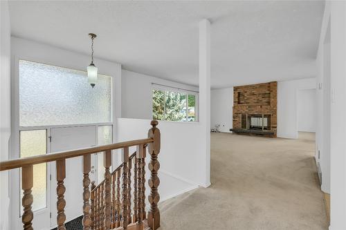 811 Tamarack Drive, Kelowna, BC - Indoor Photo Showing Other Room With Fireplace