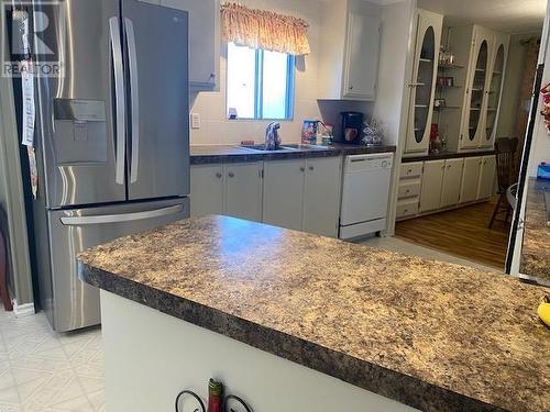 12213 Pacific Avenue, Fort St. John, BC - Indoor Photo Showing Kitchen With Double Sink