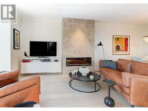 2901 Abbott Street Unit# 112, Kelowna, BC - Indoor Photo Showing Living Room With Fireplace