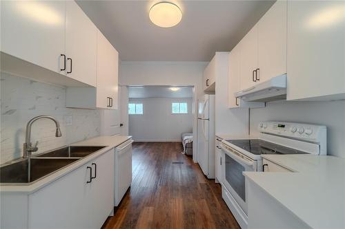 630 Burnell Street, Winnipeg, MB - Indoor Photo Showing Kitchen With Double Sink