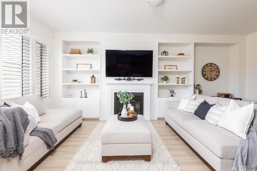 20 Hancock Crescent, Kawartha Lakes (Lindsay), ON - Indoor Photo Showing Living Room With Fireplace