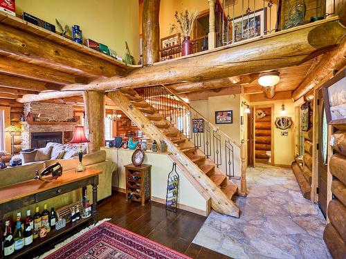 Dining room - 1000 Ch. Des Rives, Notre-Dame-De-La-Merci, QC - Indoor With Fireplace