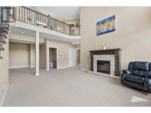 368 Trumpeter Court, Kelowna, BC - Indoor With Fireplace