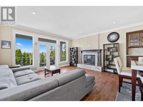 368 Trumpeter Court, Kelowna, BC - Indoor Photo Showing Living Room With Fireplace