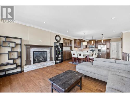 368 Trumpeter Court, Kelowna, BC - Indoor Photo Showing Living Room With Fireplace