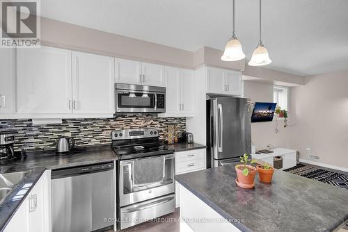 58 - 3200 Singleton Avenue, London, ON - Indoor Photo Showing Kitchen With Stainless Steel Kitchen With Double Sink With Upgraded Kitchen