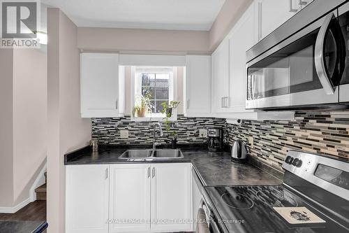 58 - 3200 Singleton Avenue, London, ON - Indoor Photo Showing Kitchen With Double Sink