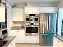 4A 338 Taylor Way, West Vancouver, BC  - Indoor Photo Showing Kitchen With Stainless Steel Kitchen With Upgraded Kitchen 