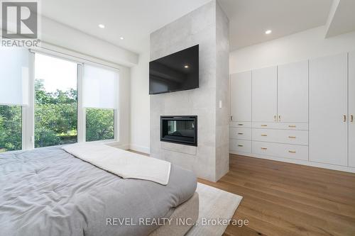 3 - 1397 York Road, Niagara-On-The-Lake, ON - Indoor Photo Showing Bedroom With Fireplace