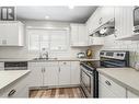 120 Hartman Road Unit# 110, Kelowna, BC  - Indoor Photo Showing Kitchen With Double Sink 