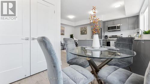 C305 - 6065 Mcleod Road, Niagara Falls, ON - Indoor Photo Showing Dining Room