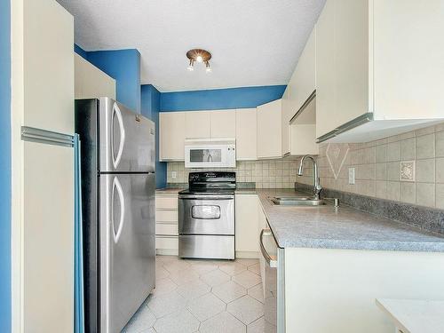 Kitchen - 301-4470 Ch. Des Cageux, Laval (Chomedey), QC 