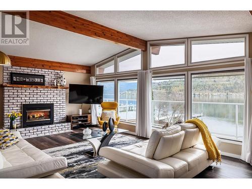 8291 Okanagan Landing Road, Vernon, BC - Indoor Photo Showing Living Room With Fireplace