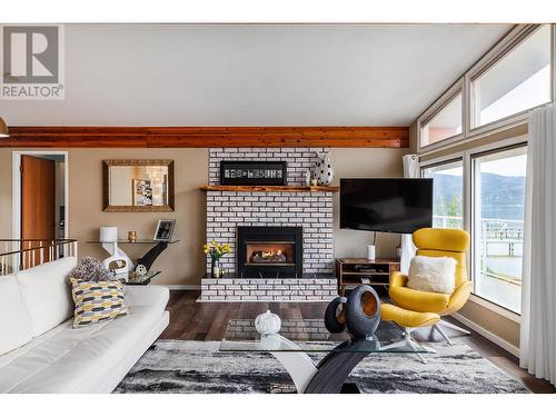 8291 Okanagan Landing Road, Vernon, BC - Indoor Photo Showing Living Room With Fireplace