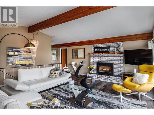 8291 Okanagan Landing Road, Vernon, BC - Indoor Photo Showing Living Room With Fireplace